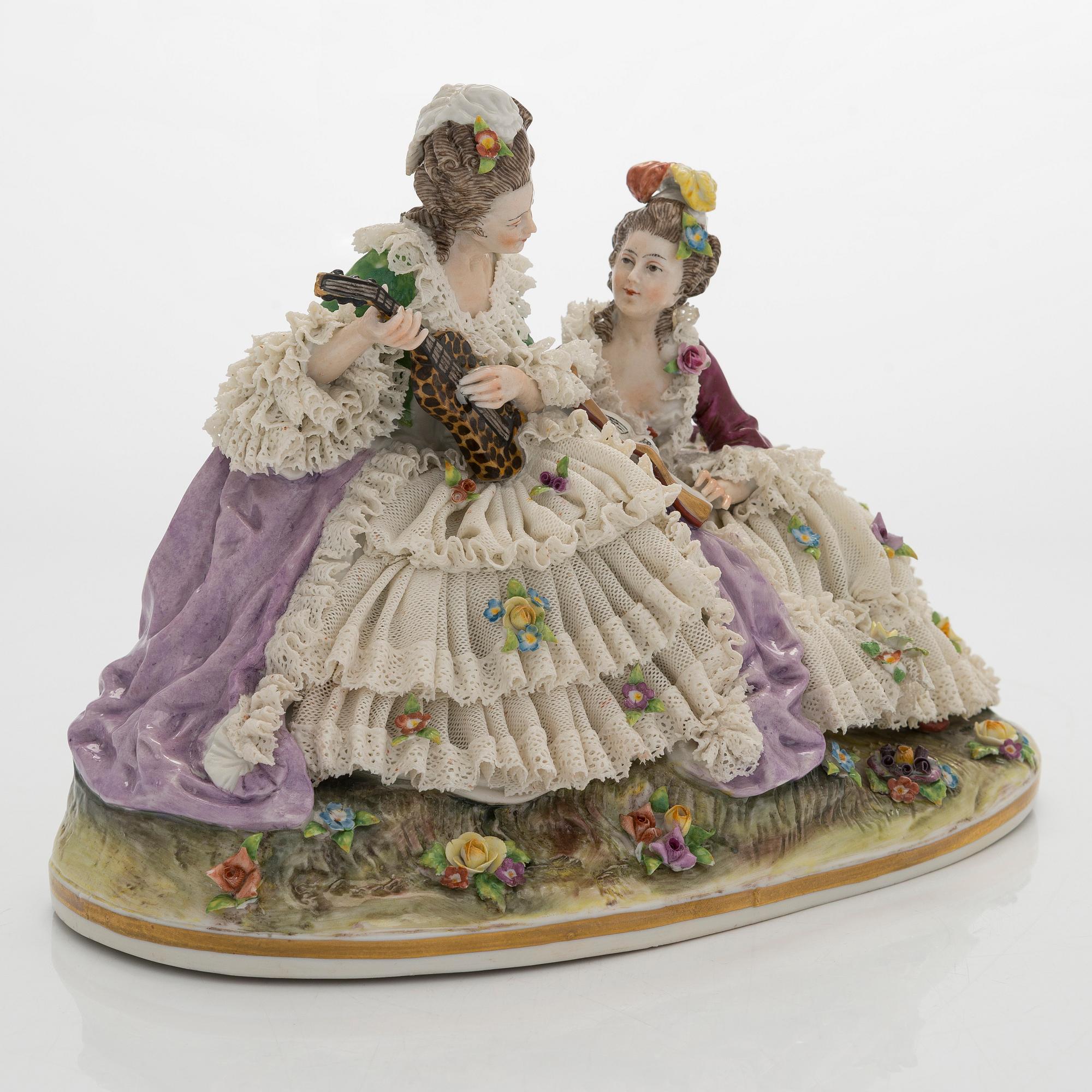 A porcelain lace figurine, Naples style mark, the 20th century.