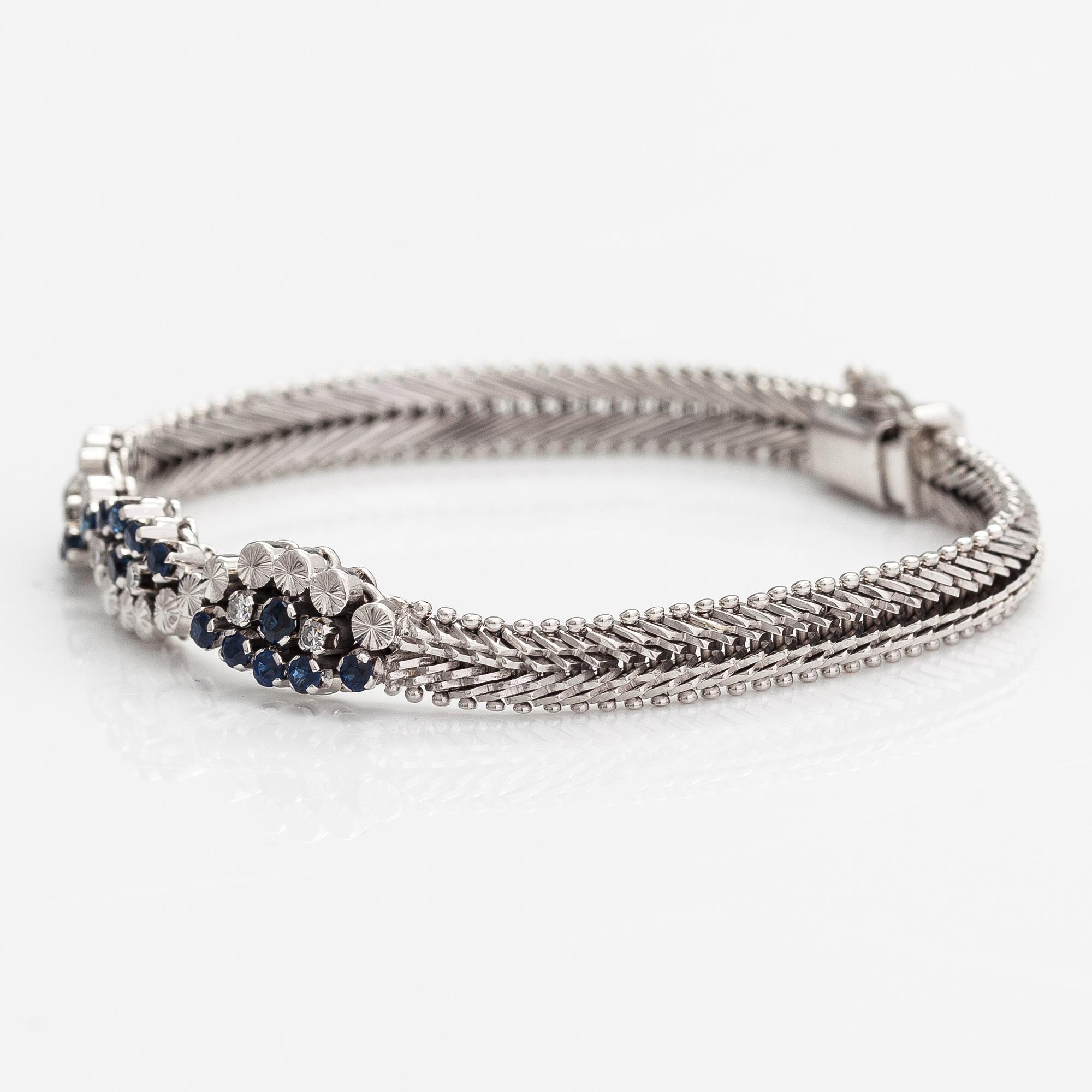 Rannekoru, 18K valkokultaa, safiireja ja timantteja n. 0.18 ct yht.