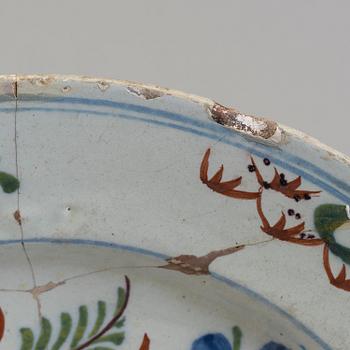 A 18th century faience plate.