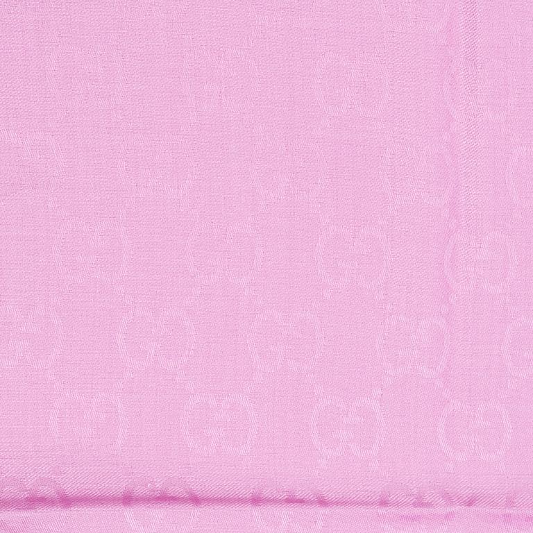 Gucci, a wool and silk mix "GG" jaquard shawl.