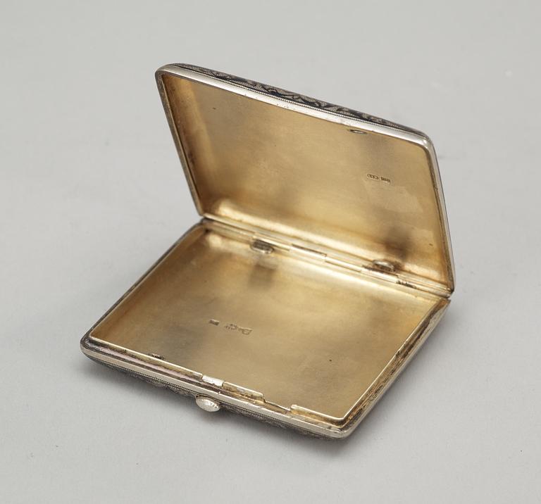 A RUSSIAN PARCEL-GILT AND NIELLO CIGARETTE-CASE, makers mark possibly of Gustav Klingert, Moscow 1888.