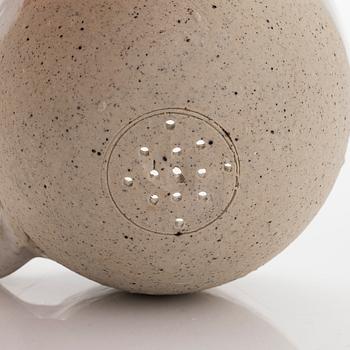 Kyllikki Salmenhaara, a stoneware tea strainer signed KS.