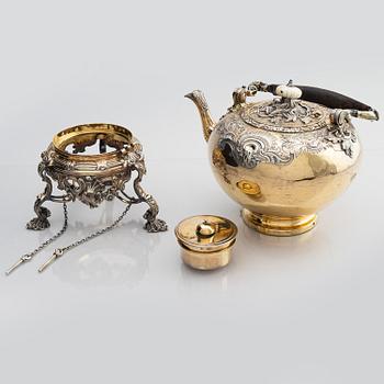 An English silver-gilt teapot with stand and burner, mark of Richard Sibley I, London 1825.