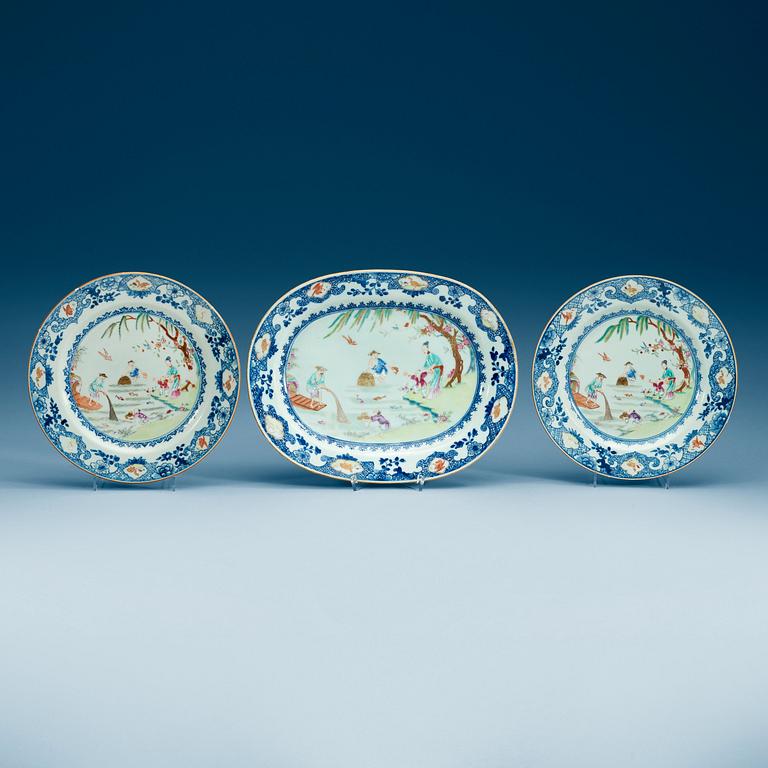 A famille rose serving dish and two dinner plates, Qing dynasty, Qianlong (1736-95).