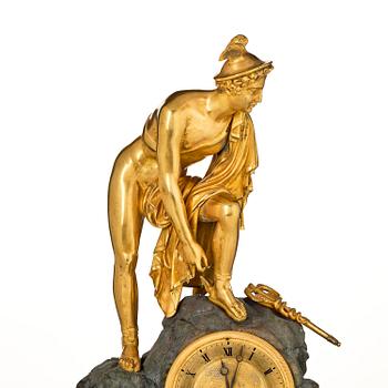 A French Empire ormolu and patinated bronze mantel clock, Paris, early 19th century.