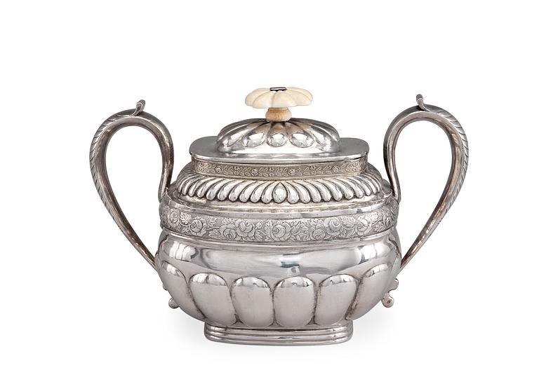A SUGAR BOWL WITH A LID.