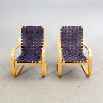 Alvar Aalto, a pair of birch armchairs model 406 21st century.