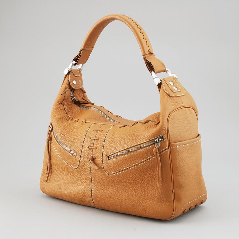 TOD'S, a tan leather bag.