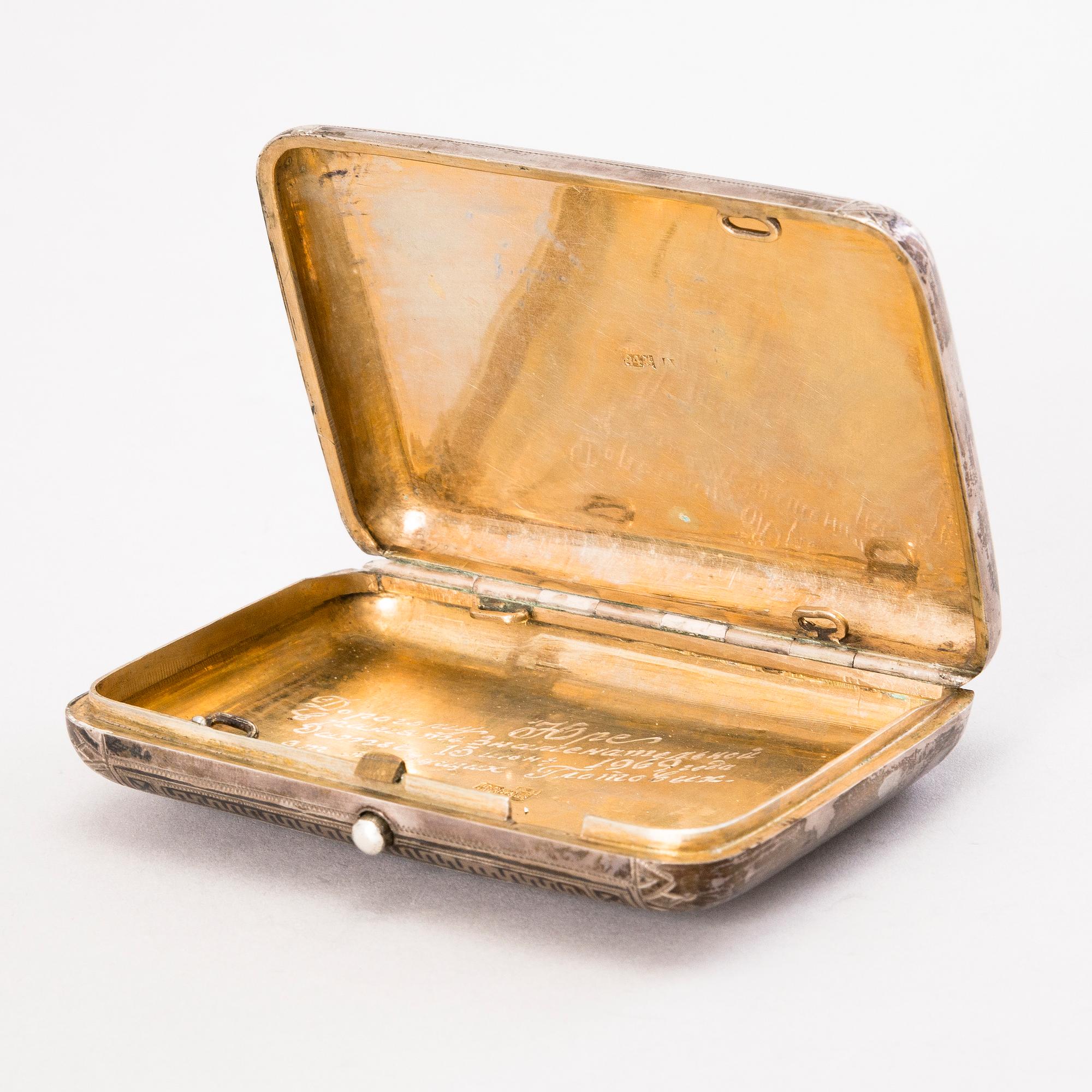 A Russian silver and niello cigarette case, assay master  Lev Fridrikhovitch Oleks, Moscow 1889.