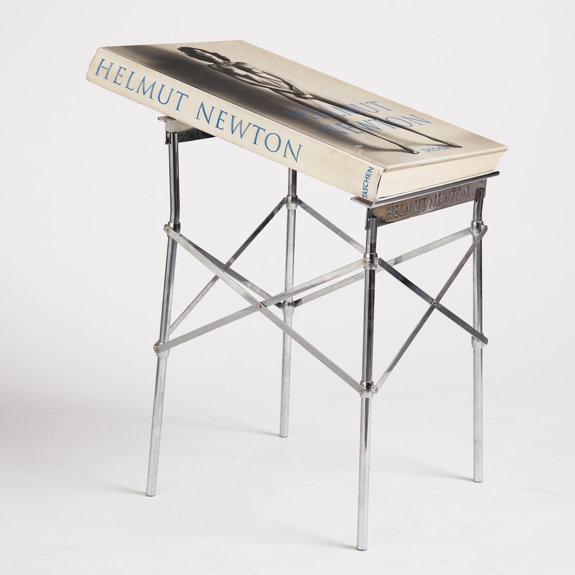 Helmut Newton, Signed book published by Taschen, Monte Carlo, 1999, ed 10000, with a metal table.