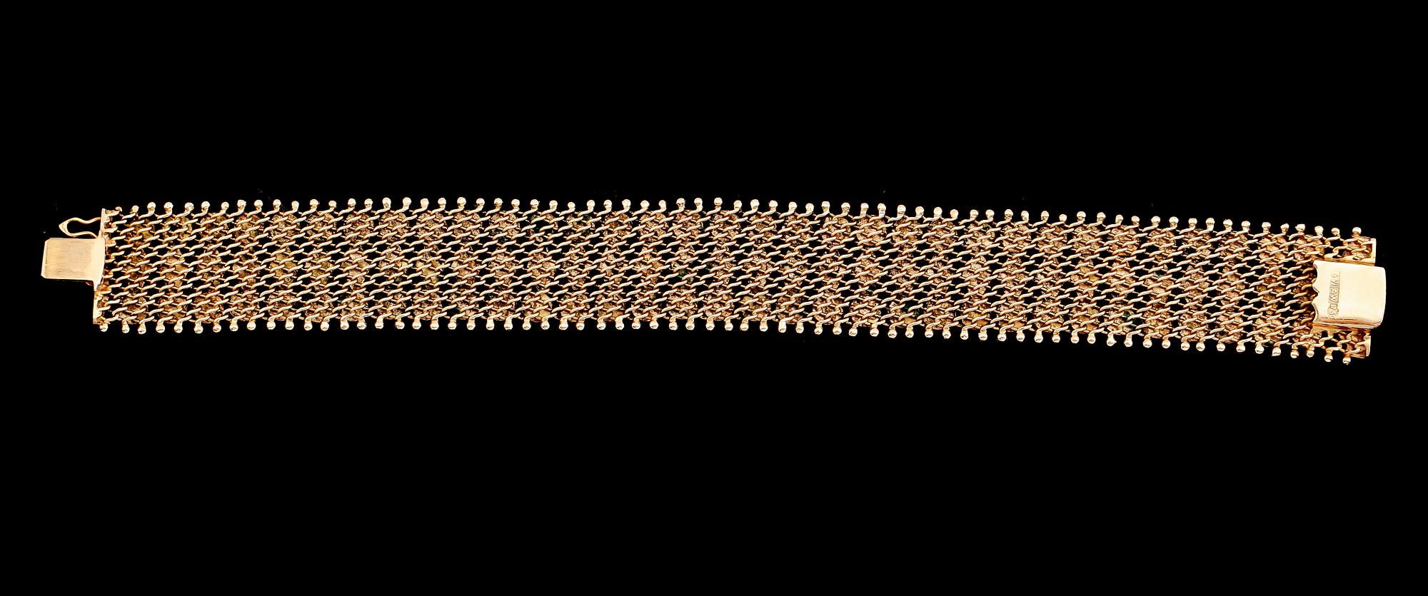 ARMBAND, 18 k guld. Vikt ca 35 g.