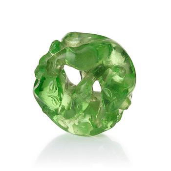 1047. A green sculptured bead, Qing dynasty.