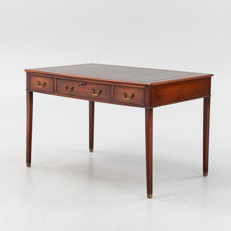 An English style mahogany desk, second half of the 20th century.