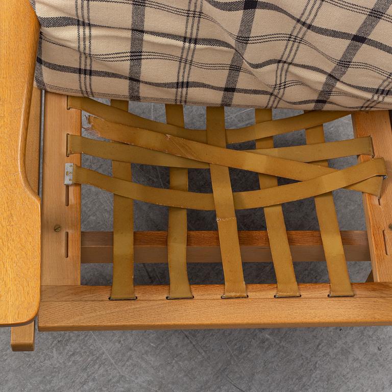 HANS J WEGNER, a pair of oak easy chairs, Getama, Denmark.