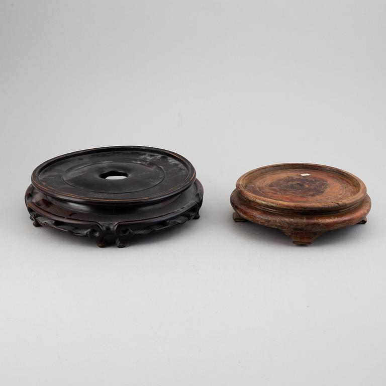 19 Chinese wooden stands, 20th century.