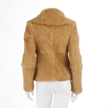 DOLCE & GABBANA, a yellow rabbit fur jacket. Size 38.