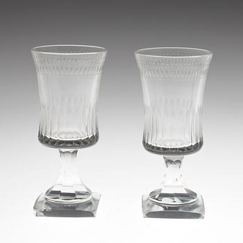 A SET OF TENN WINE GLASSES.