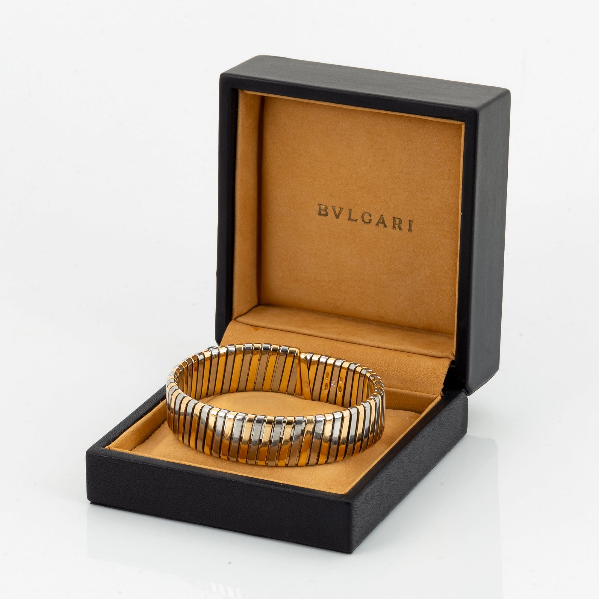 A Bulgari "Tubogas" bracelet in 18K gold and steel.