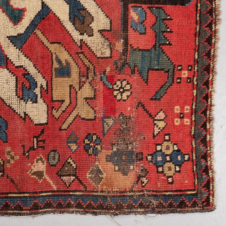 A rug, Antique so called "Sunburst Karabagh" or "Eagle Kazak", ca 174 x 138 cm.