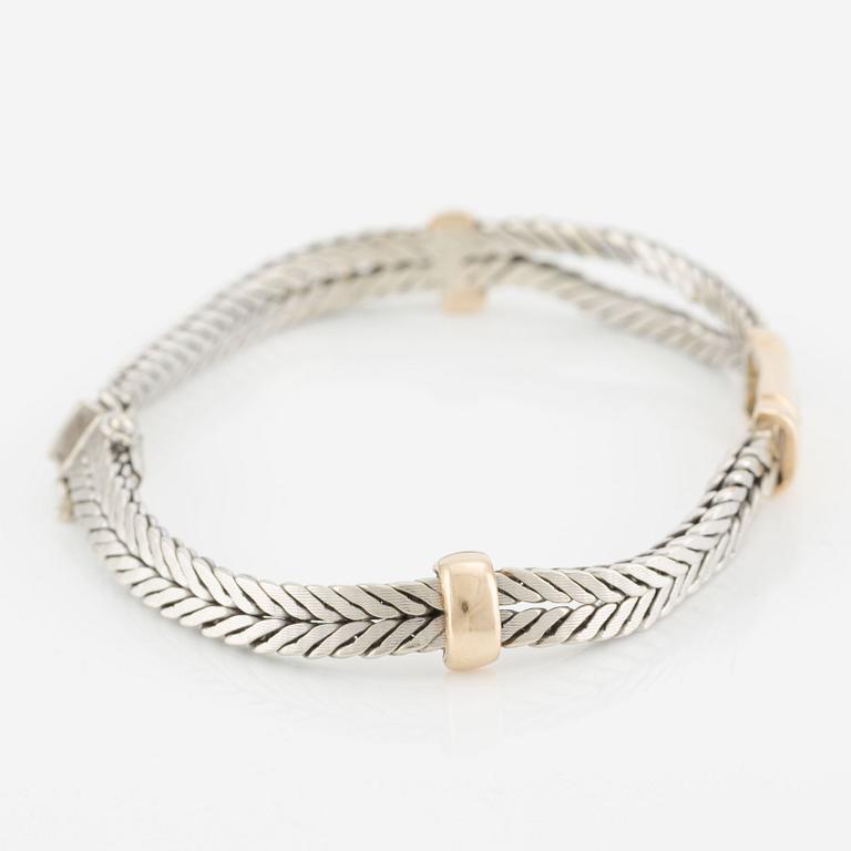 Armband, 18K guld och vitguld med briljantslipade diamanter.