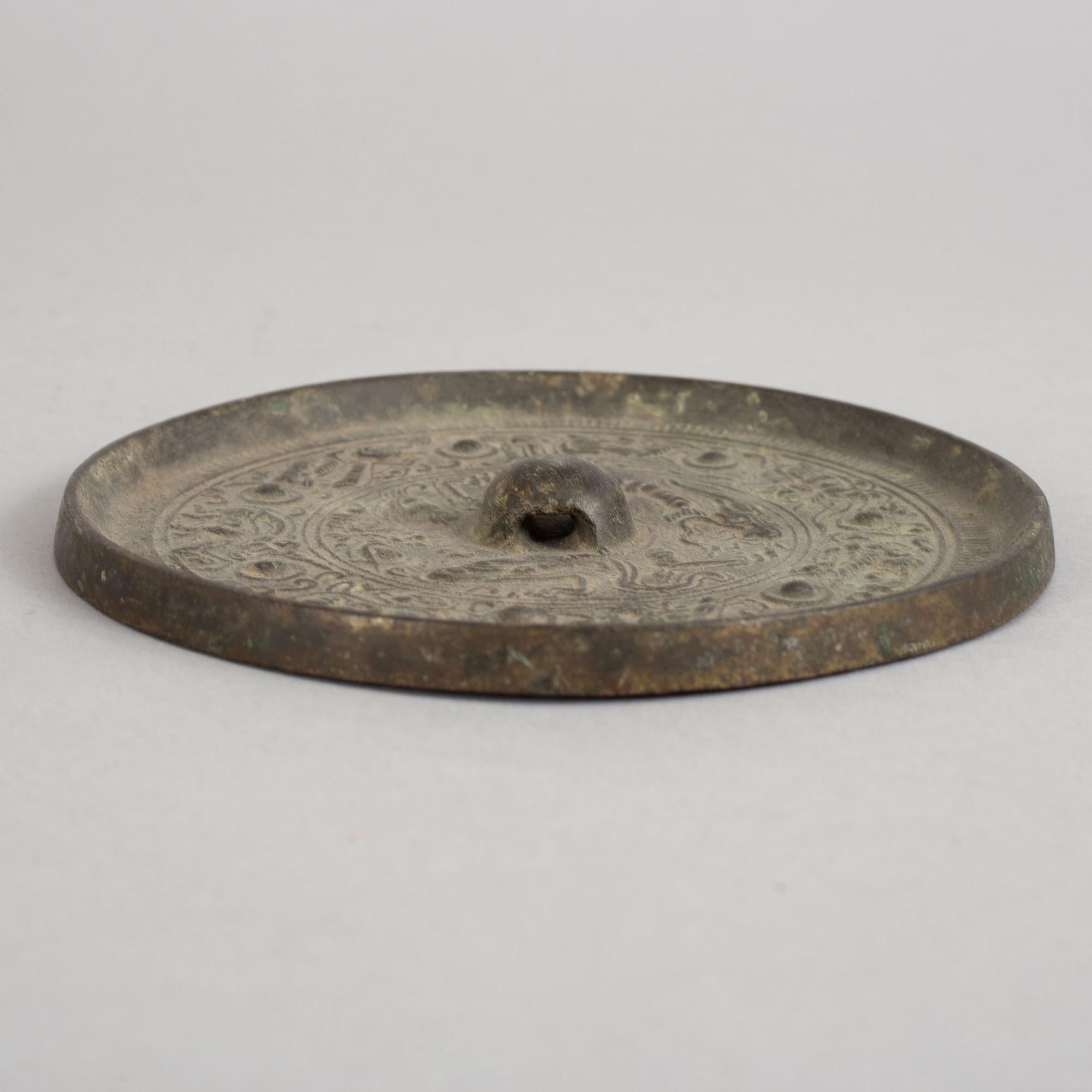 SPEGEL, brons. Handynastin (206 f. Kr. -220 e. Kr.).