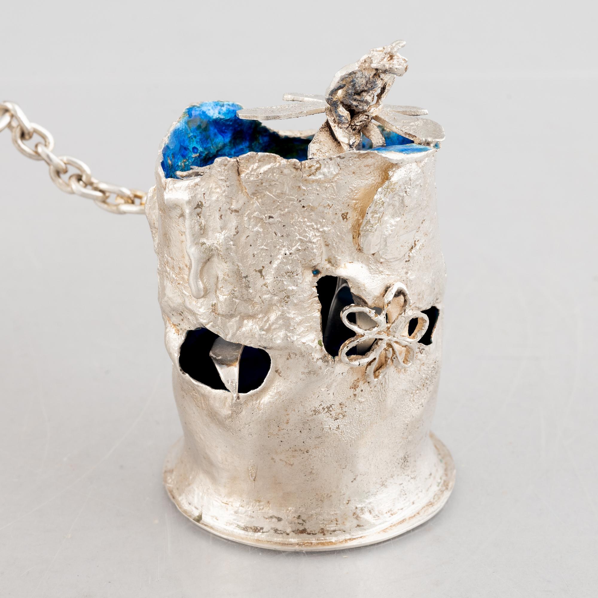 A sterling silver sculpture in two parts with a chain, mark of Lars Arby, Gothenburg, Sweden 1976.