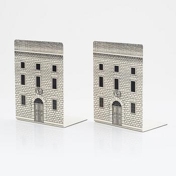 Piero Fornasetti, a pair of metal book stands.