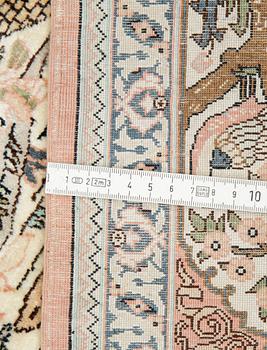 A carpet, oriental silk, ca 177 x 123 cm.