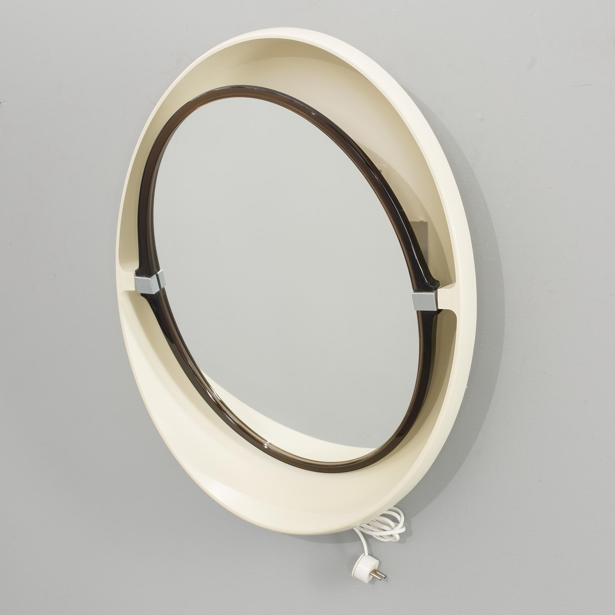 A "SPACE AGE" WALL MIRROR WITH LIGHT BY ALLIBERT, 1970´s.