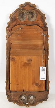 A Rococo mirror, 18th Century.