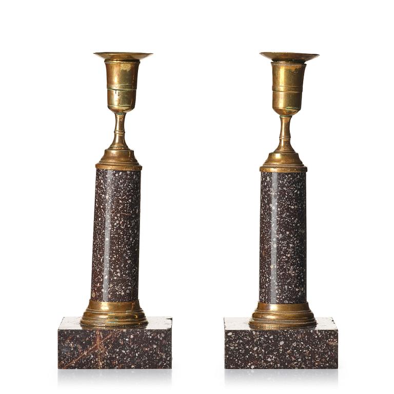 A pair of late Gustavian gilt-brass and 'Blyberg' porphyry candlesticks, Stockholm, circa 1800.