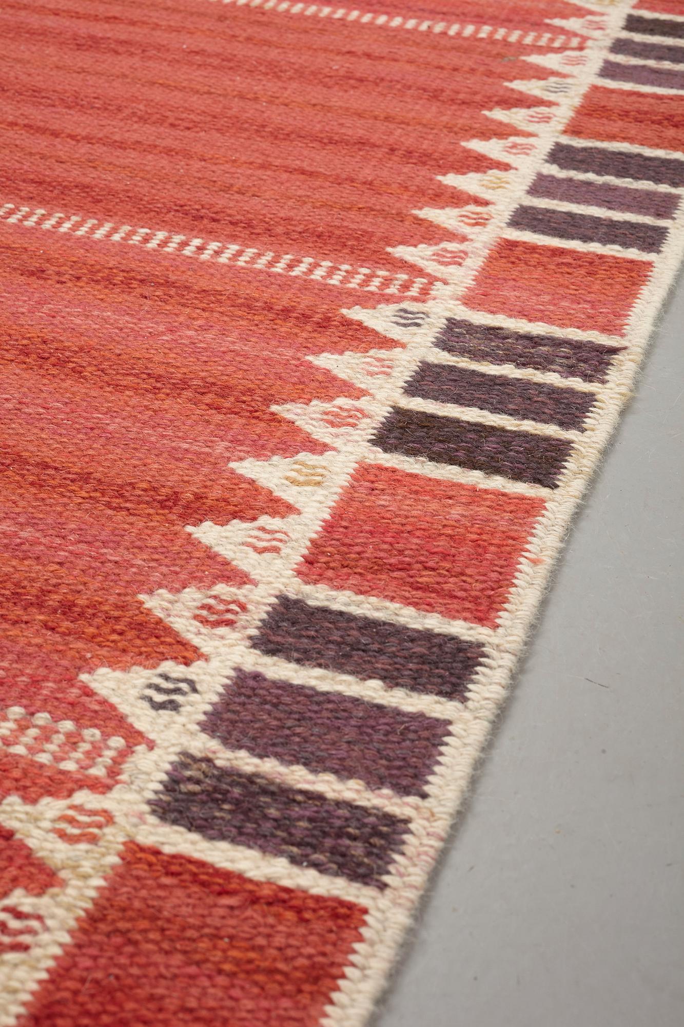 Barbro Nilsson, A CARPET, "Salerno kallröd med enkel bård", flat weave, ca 217 x 149,5 cm, signed AB MMF BN.