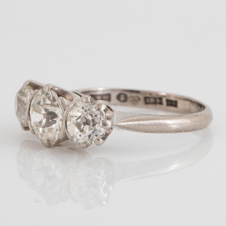 An 18K white gold ring set with old-cut diamonds.