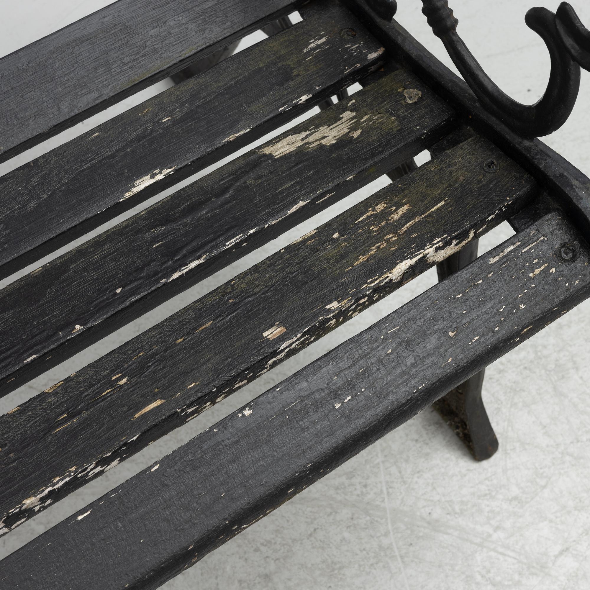 A garden bench, late 20th century.