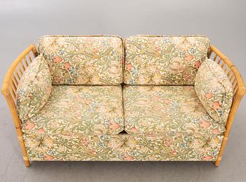 A bamboo and rattan sofa later  part of the 20th century.