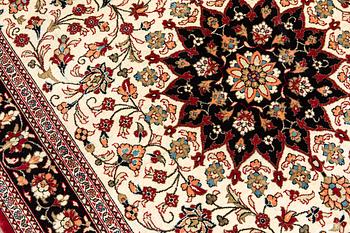 A carpet, Silk Qum, ca 116 x 75 cm.