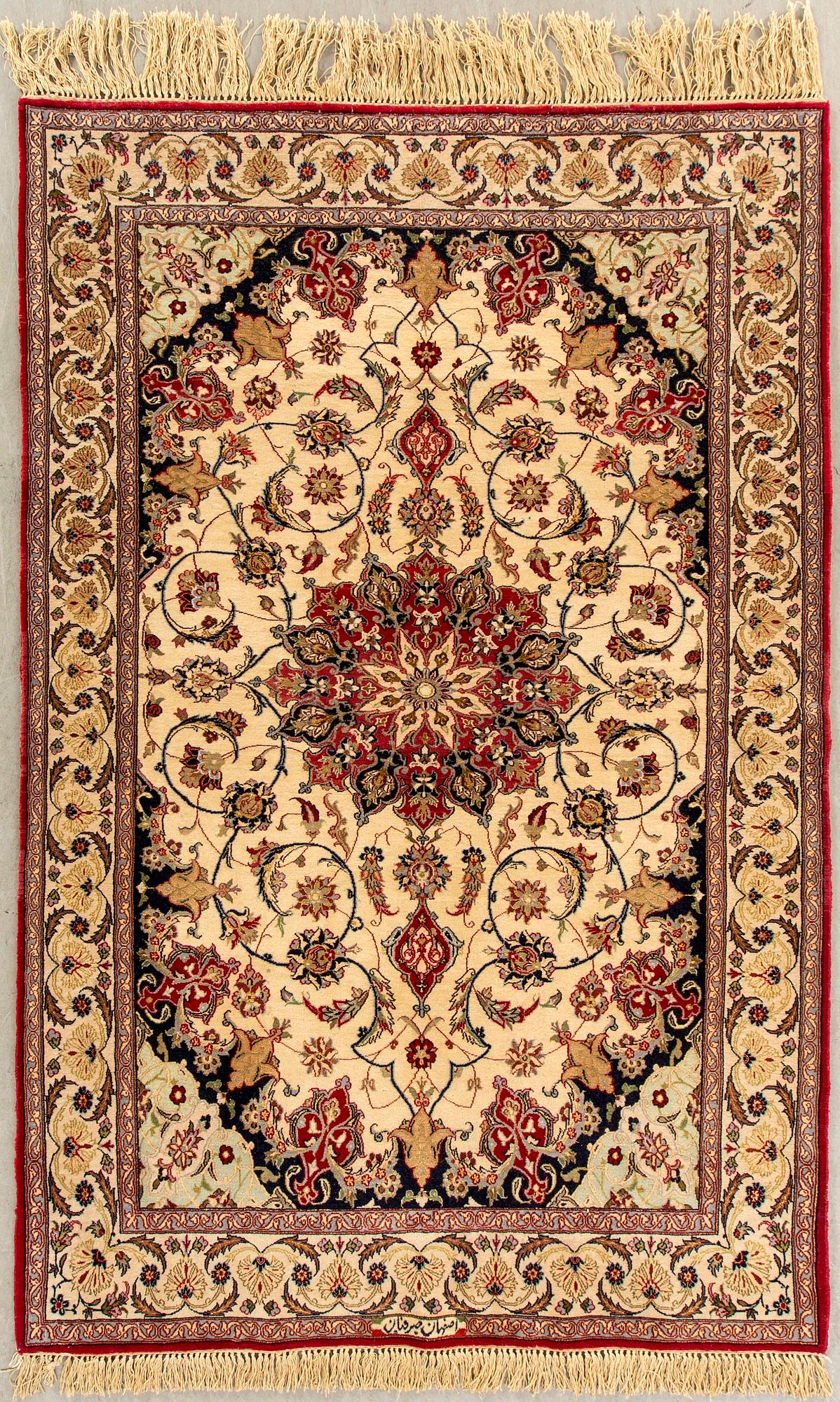 An Isfahan carpet semiantique paret silk on silk signed Seirafian ca 162 x 107 cm.