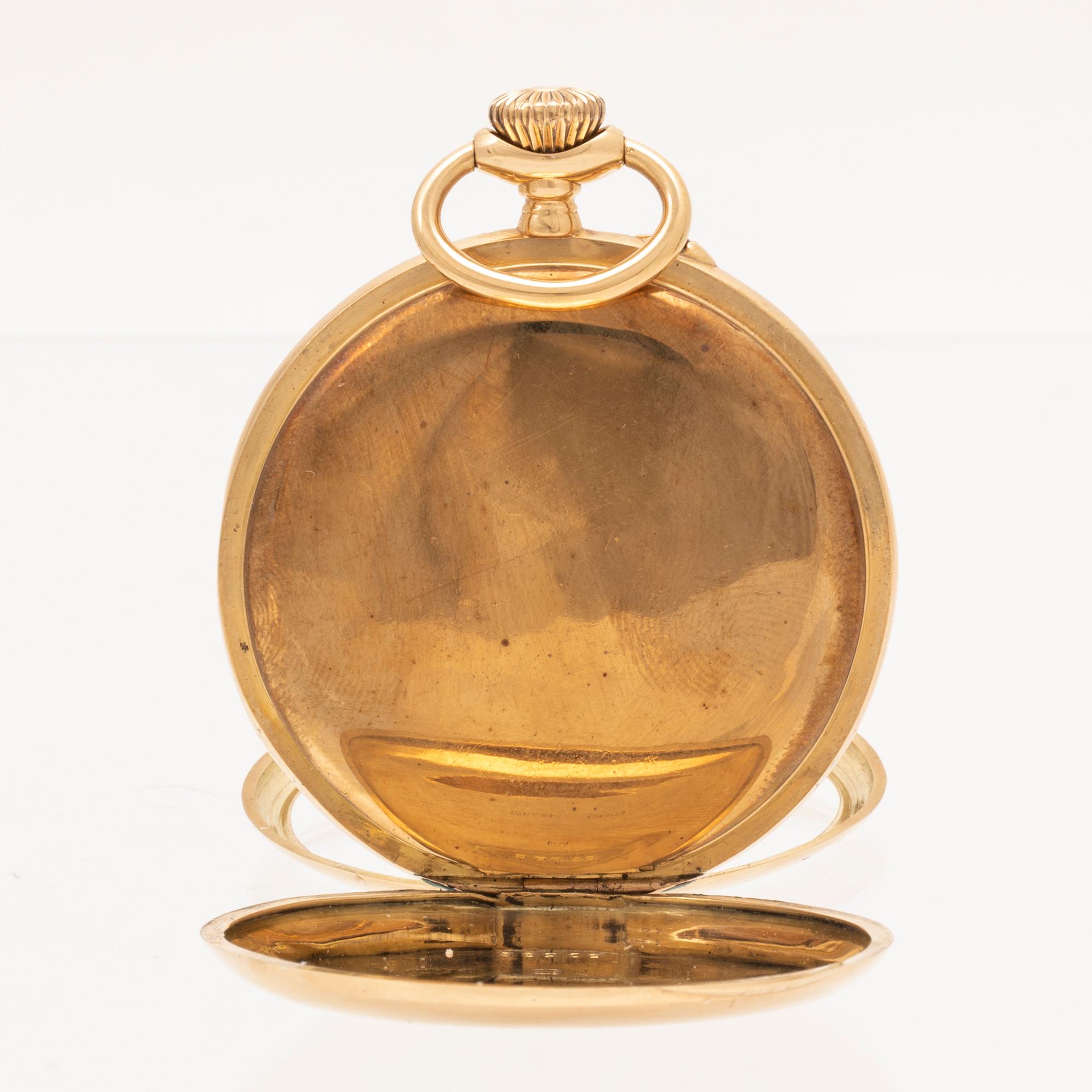 An 18K gold pocket watch by Alex Hüning, Geneve.