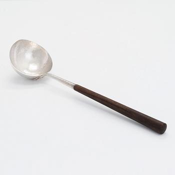 Tapio Wirkkala, a sterling silver and rosewood punch ladle, Kultakeskus, Hämeenlinna, Finland 1972.