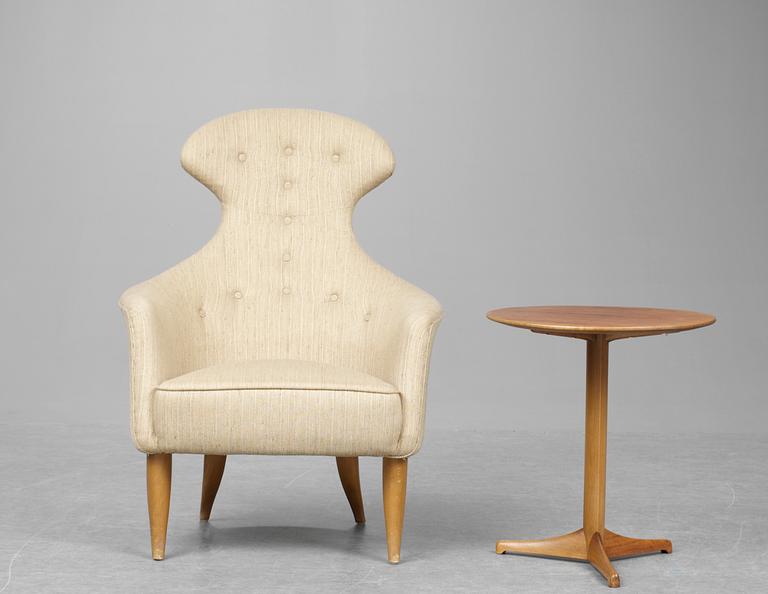 A Kerstin Hörlin Holmquist easy chair "Stora Eva " and a table "Äpplet", in the set of furniture called "The Paradise", Nordiska Kompaniet 1960's.