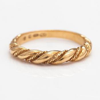 An 18K gold ring "Twined jewellery from Lampola in Halikko". Kalevala koru, Helsinki 1978.