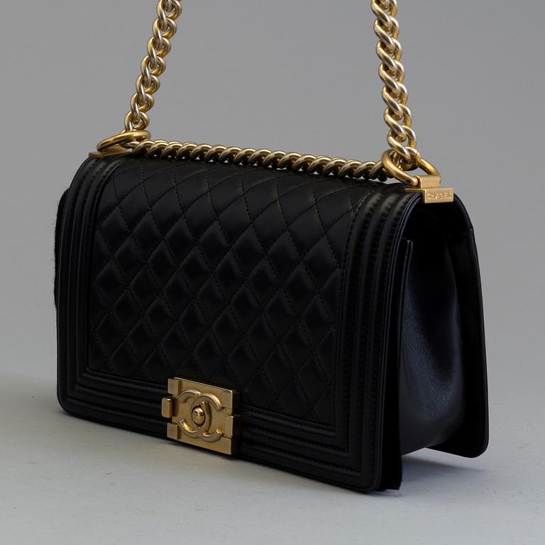 a Chanel "Boy Bag" 2016.