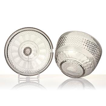 A cut glass punch bowl with cover, stand and ladle, Empire, first part of the 19th century.