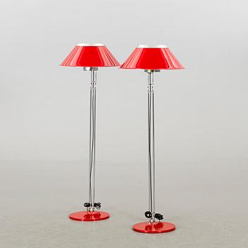 A pair of Anders Pehrson floor lamps.