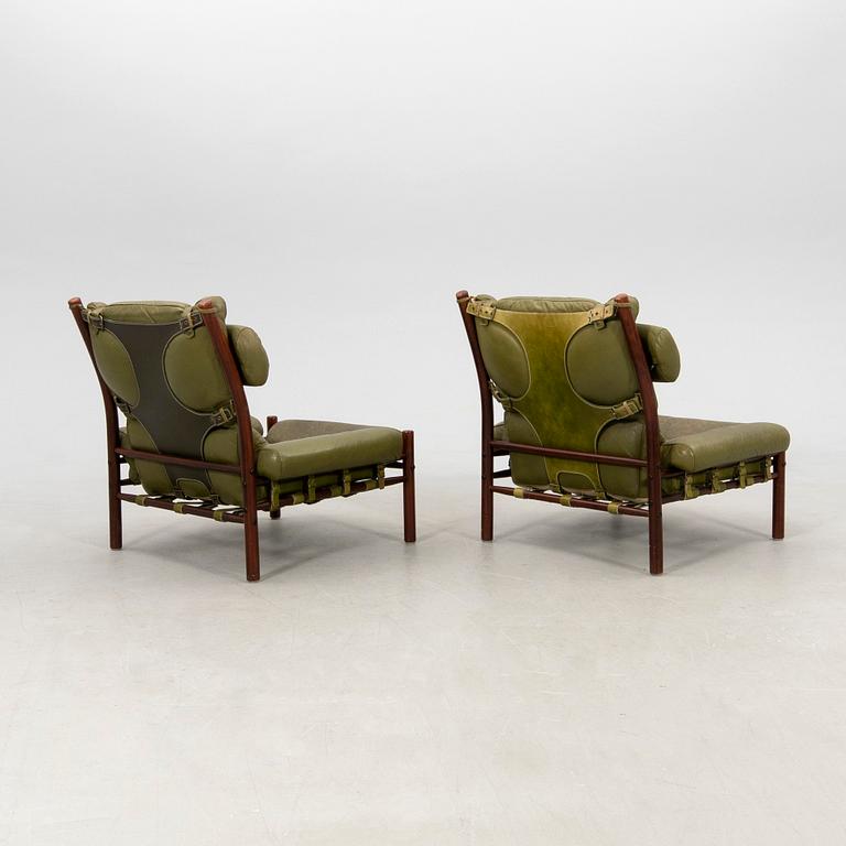 Arne Norell, a pair of armchairs and a footstool "Inca", Norell Möbel AB, second half of the 20th century.