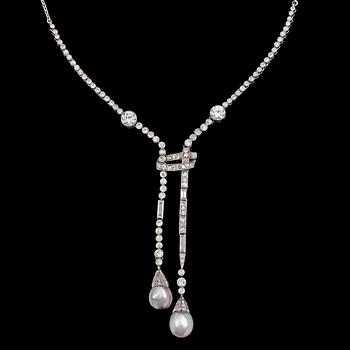 973. A diamond and natural pearl necklace, tot. app. 2.80 cts. C. 1925. Jays, London.