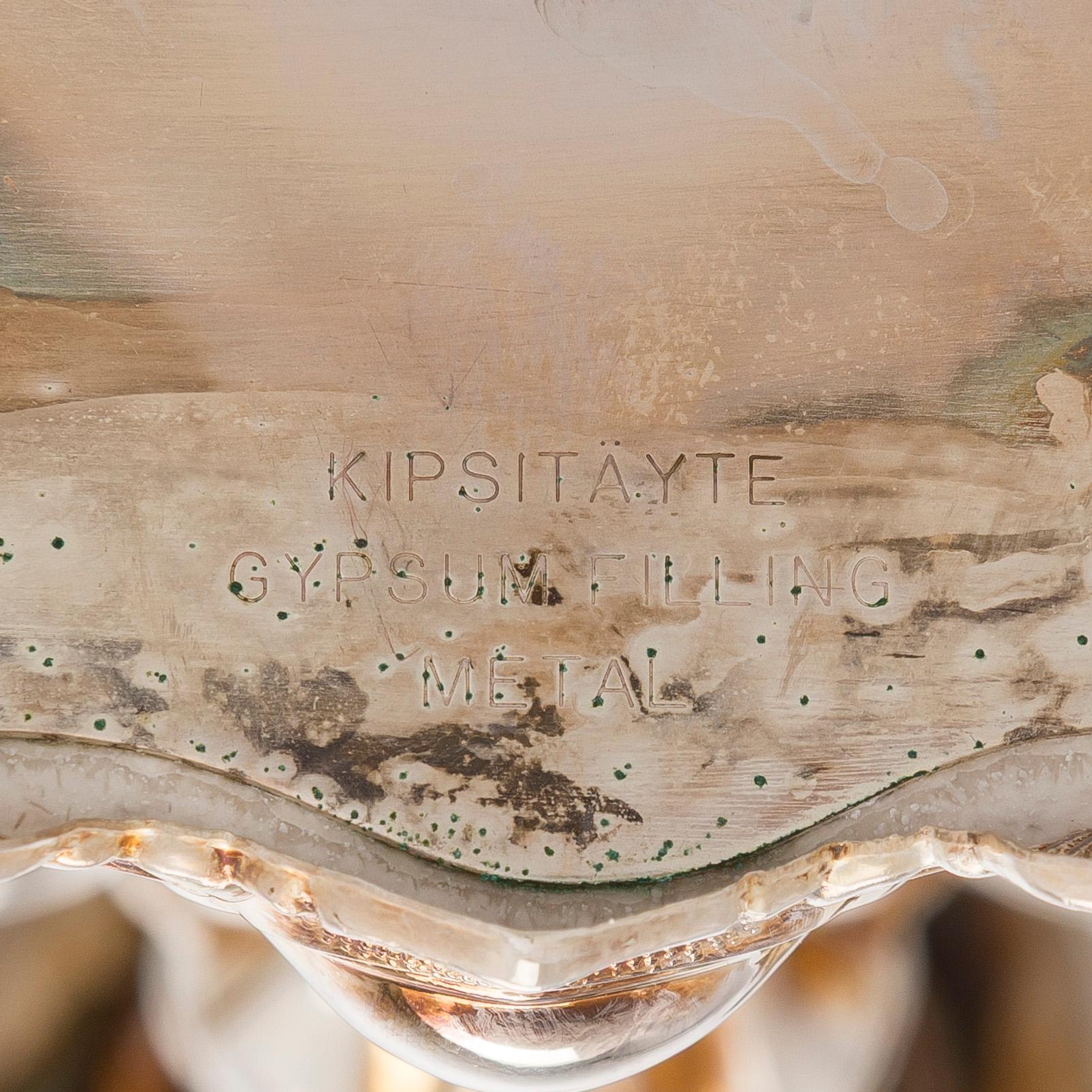 A silver candelabra and a pair of silver candlestick, Kultakeskus Hämeenlinna 1962 and 1985.