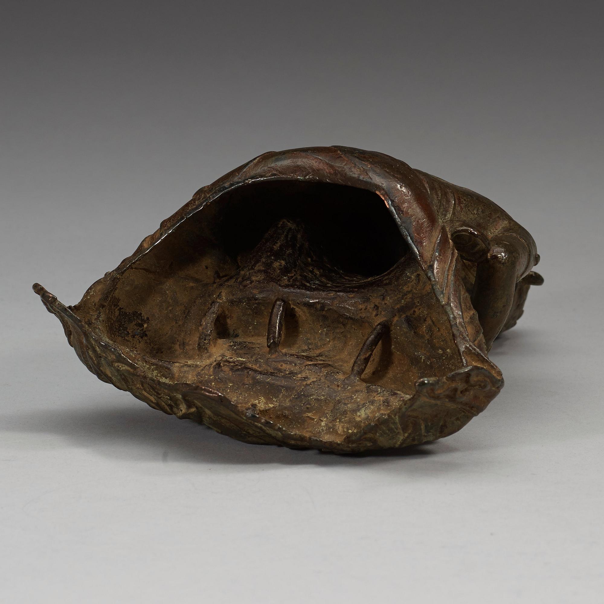 A seated bronze figure of Guanyin, Ming dynasty (1368-1644).