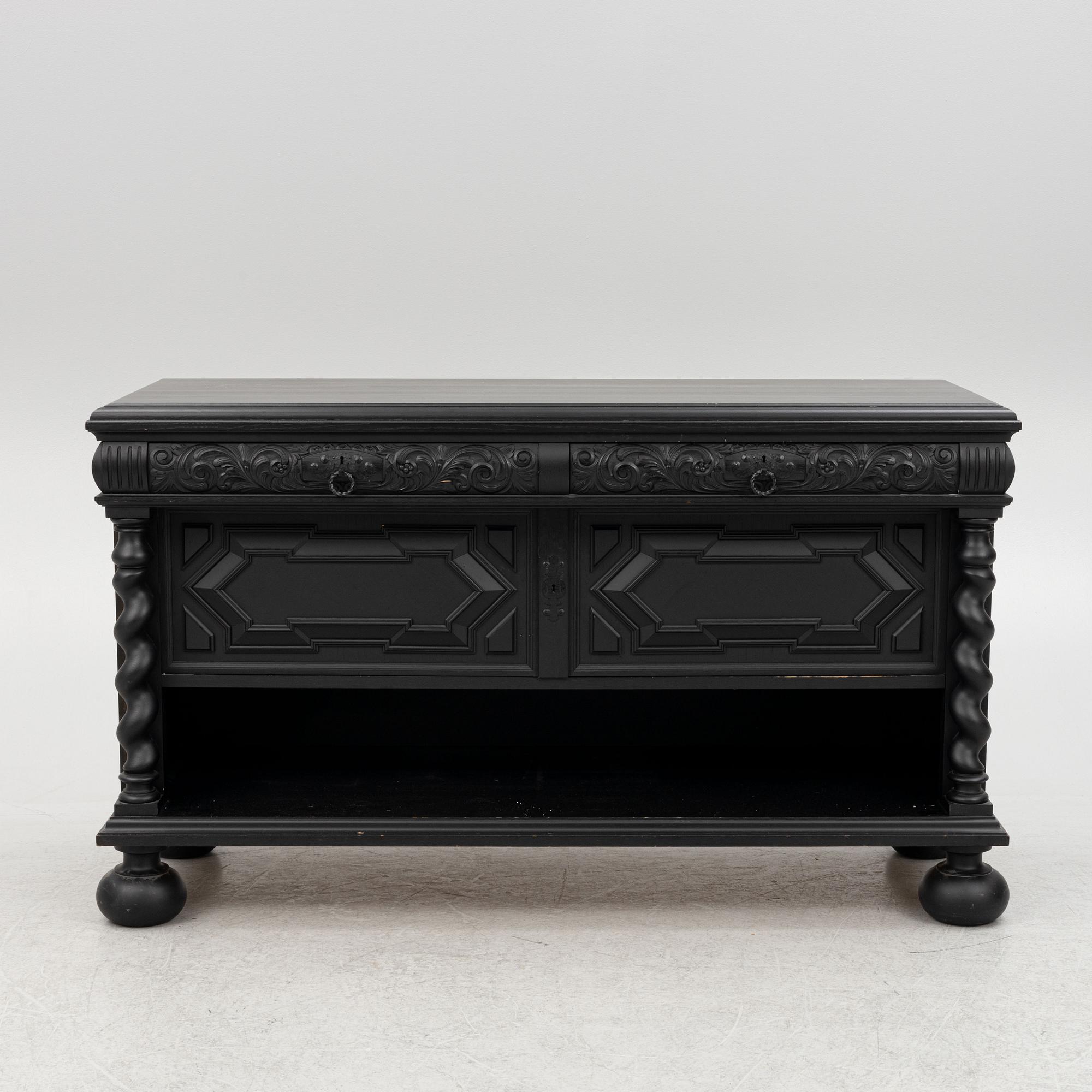 A Baroque style sideboard, first half of the 20th Century.