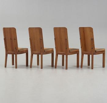 A set of four Axel Einar Hjorth stained pine 'Lovö' chairs, Nordiska Kompaniet, Sweden 1930's.